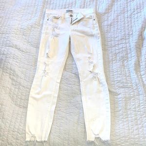 Express ripped jeans. “Ankle Legging Mid rise”